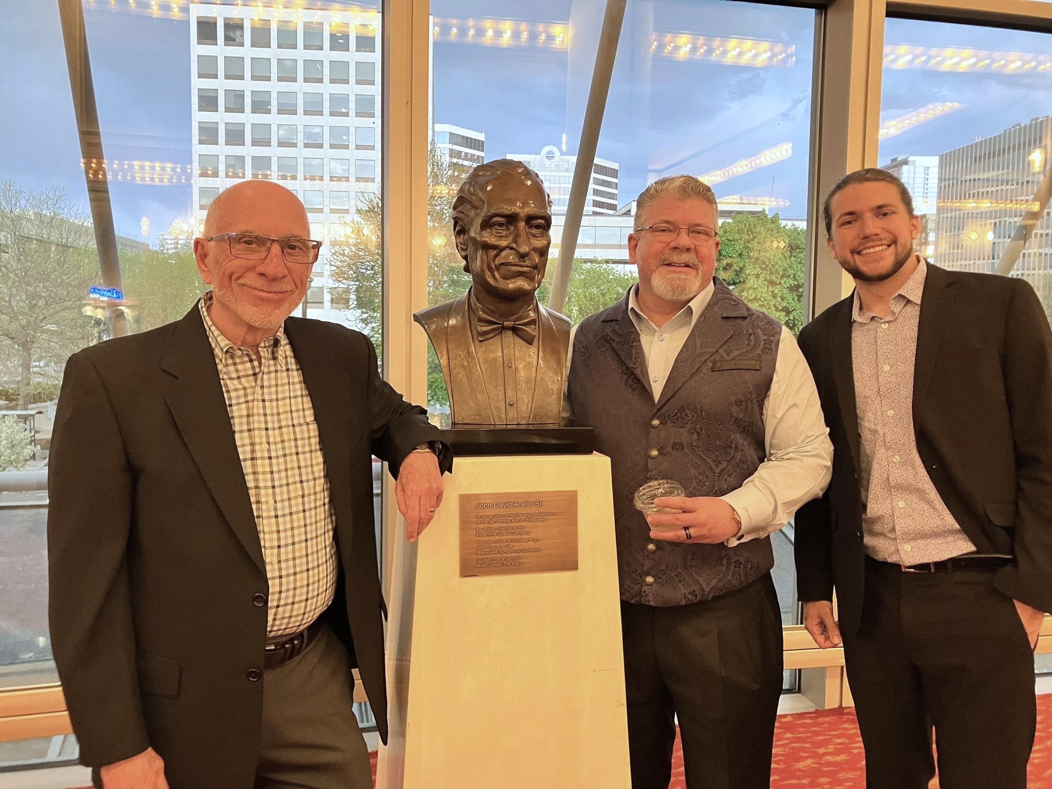 Jim Anello, John David Anello III, and Gio Anello with Bronze Bust of John-David Anello